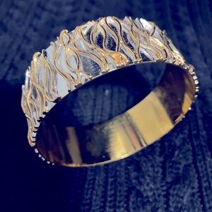 Gold and silver bangle bracket that a plus size wrist!